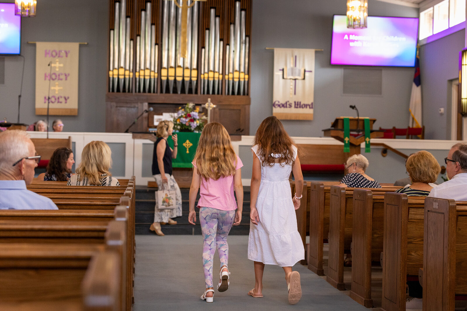 Children coming forward for the children's message