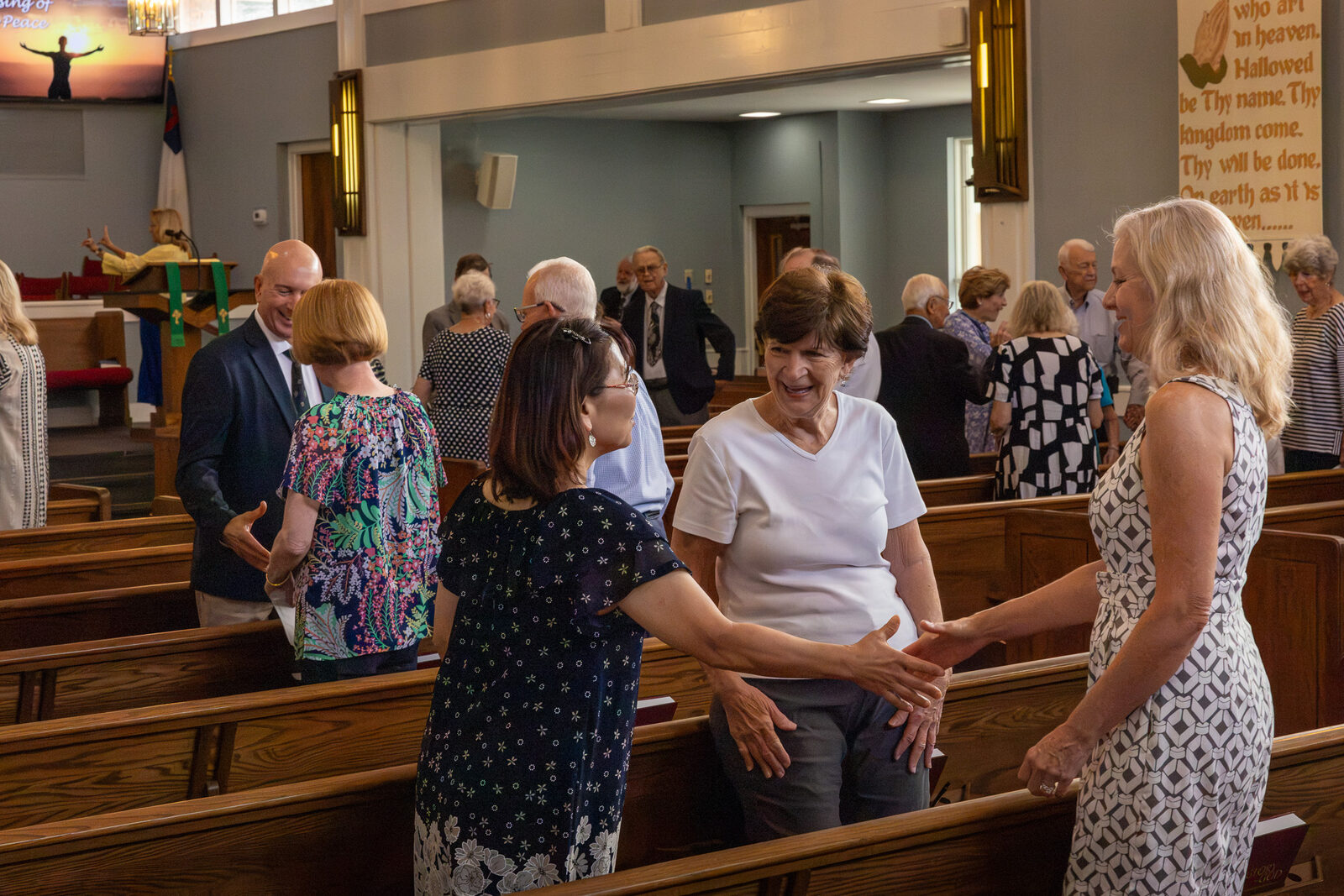 Friends visiting after worship